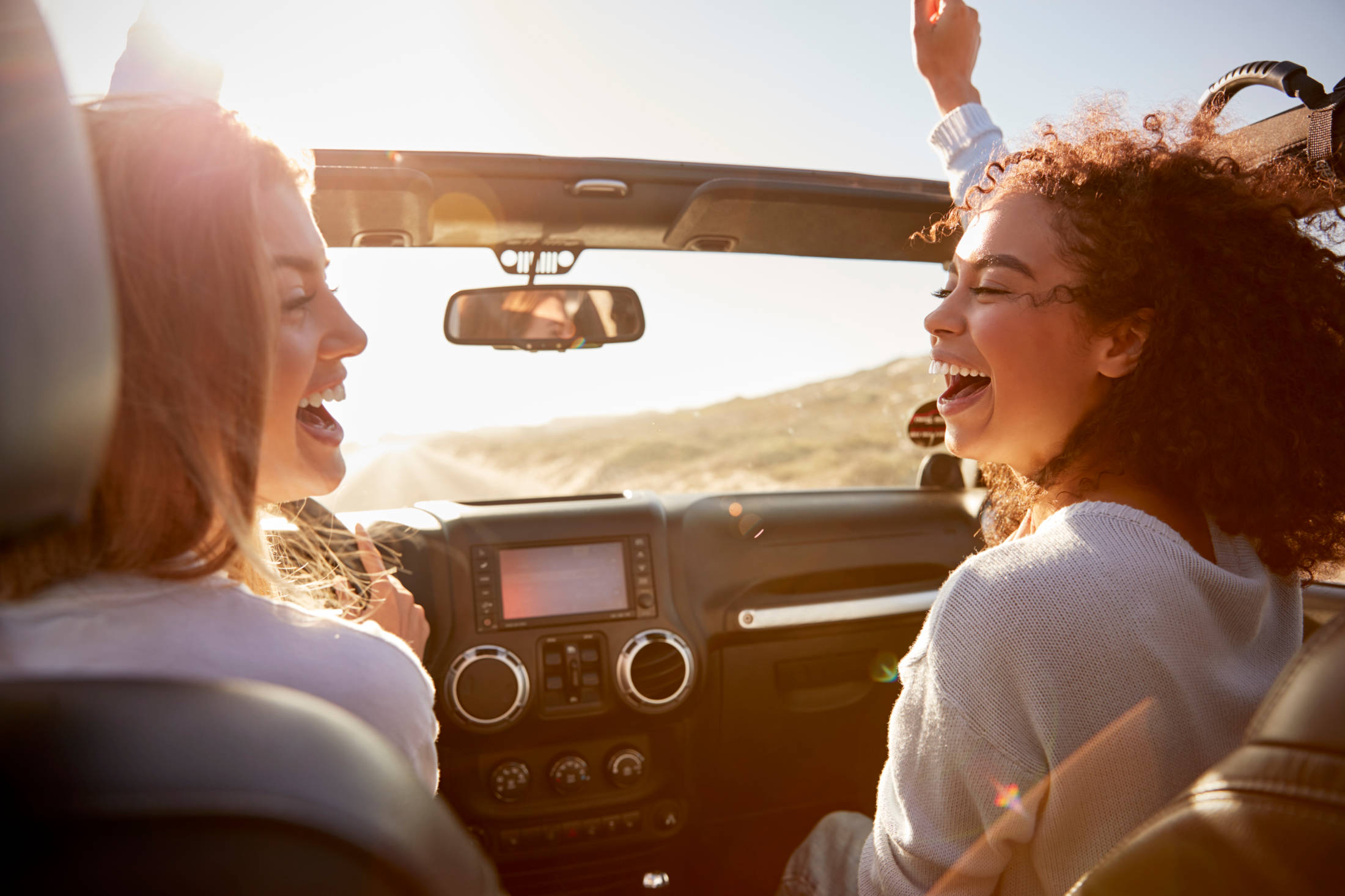 girls having fun driving