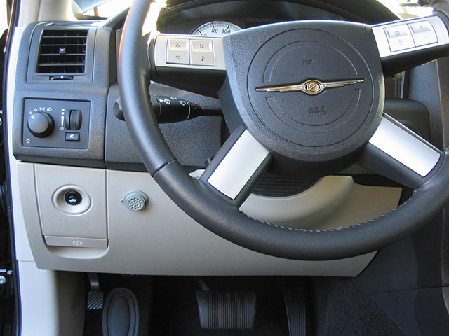 Ravelco key unit installed in the lower dash of a Chrysler 300 